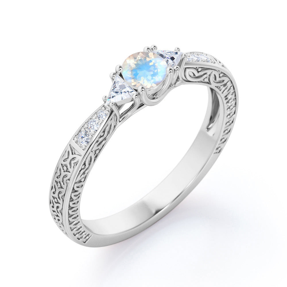 Vintage Filigree Nature-Inspired 0.6 carat Round Moonstone and Moissanite Engagement Ring in Rose Gold
